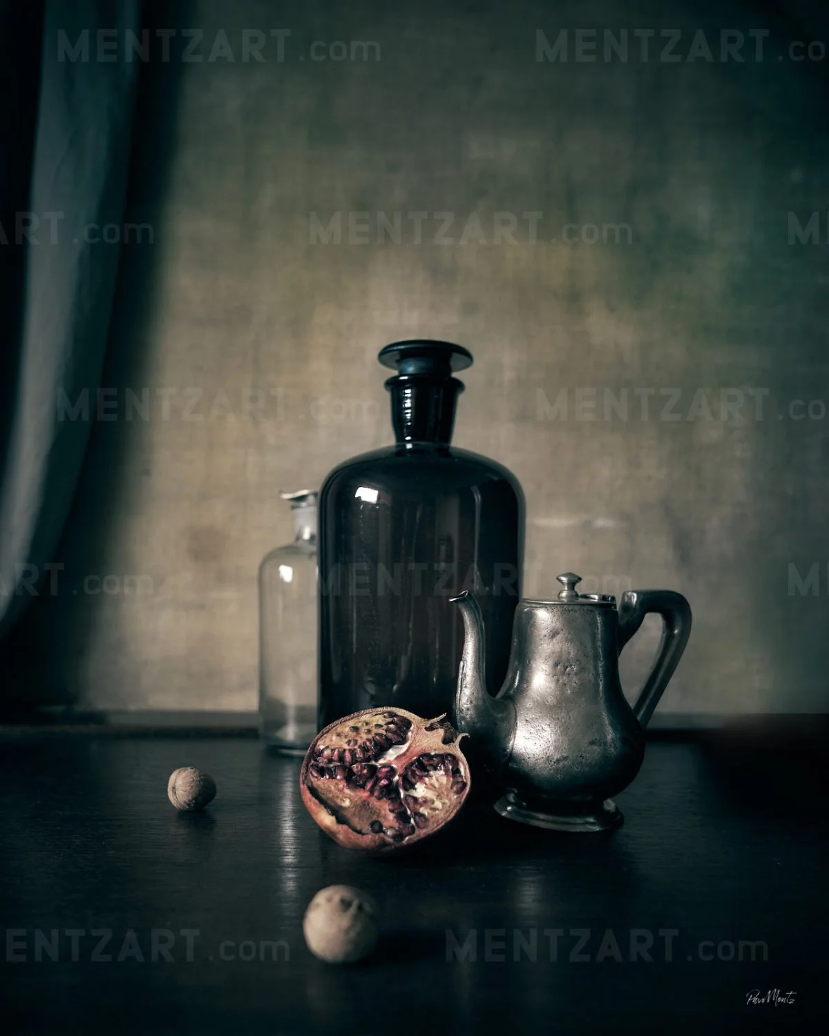 Still life with silver decanter and pomegranate fruit