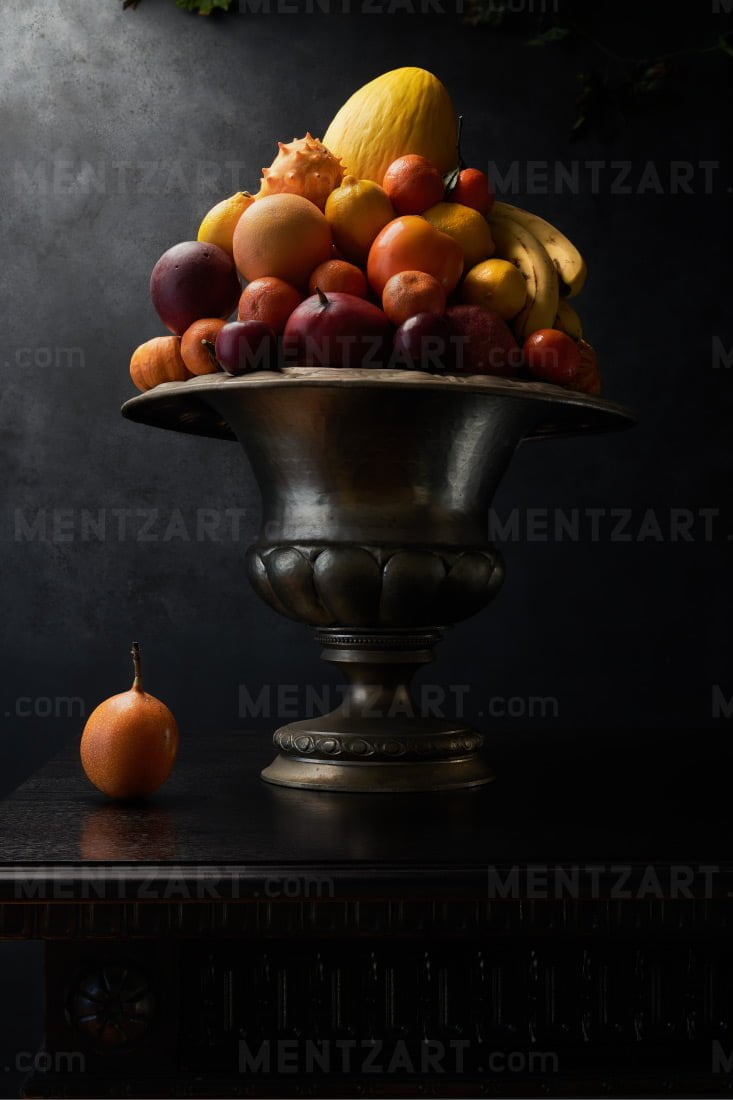 Still life with color fruits in a silver vase