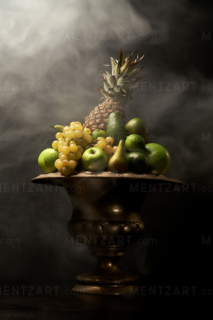 Still life with green fruits shrouded in mist